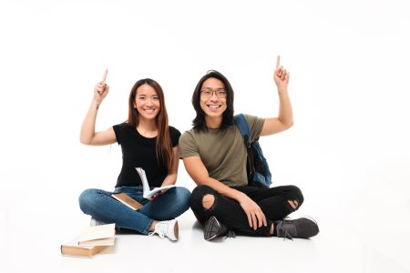 portrait smiling cheerful asian students couple